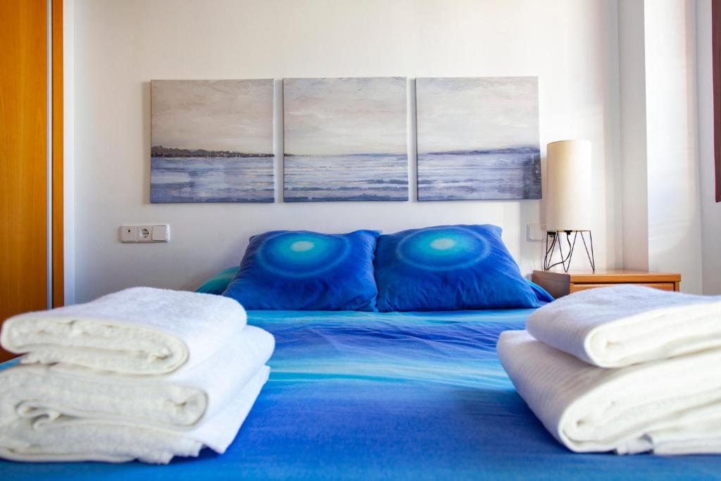 Postel nebo postele na pokoji v ubytování Apartamento a 50 metros de la playa, Luminoso y acogedor