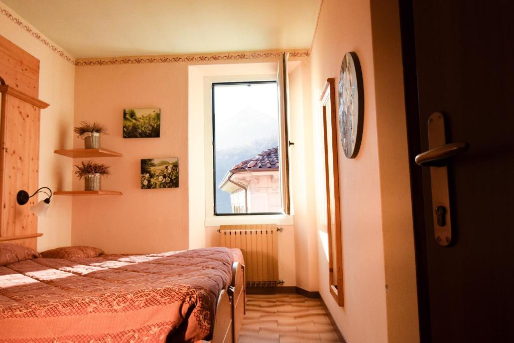 Postel nebo postele na pokoji v ubytování Hotel Moderno Restaurant