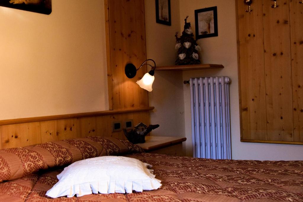 Postel nebo postele na pokoji v ubytování Hotel Moderno Restaurant