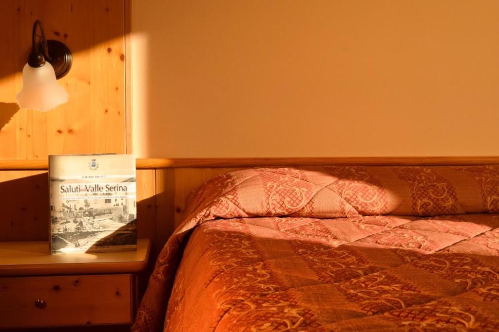 Postel nebo postele na pokoji v ubytování Hotel Moderno Restaurant