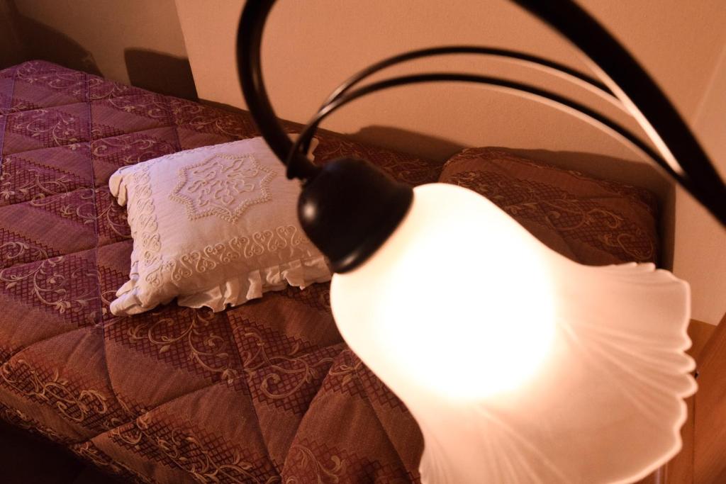 Postel nebo postele na pokoji v ubytování Hotel Moderno Restaurant