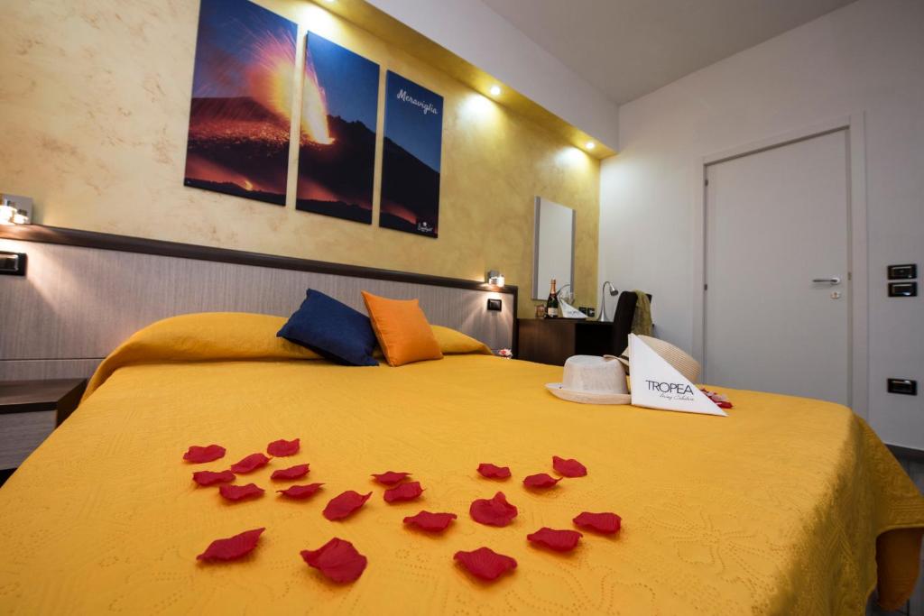 Postel nebo postele na pokoji v ubytování B&B Sunlight Tropea