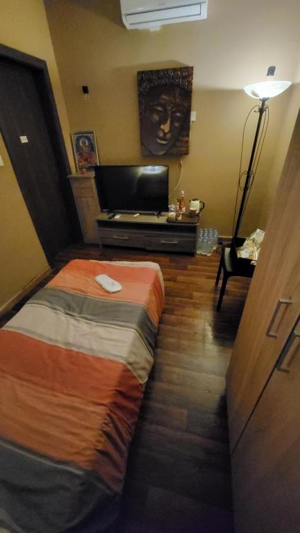 Postel nebo postele na pokoji v ubytování Lotus Guest House Malta