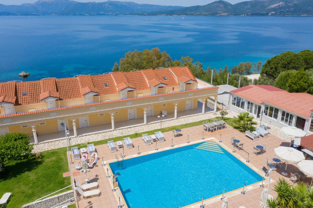 an aerial view of a large house with a swimming pool at KOSTA MARIA in Paleros