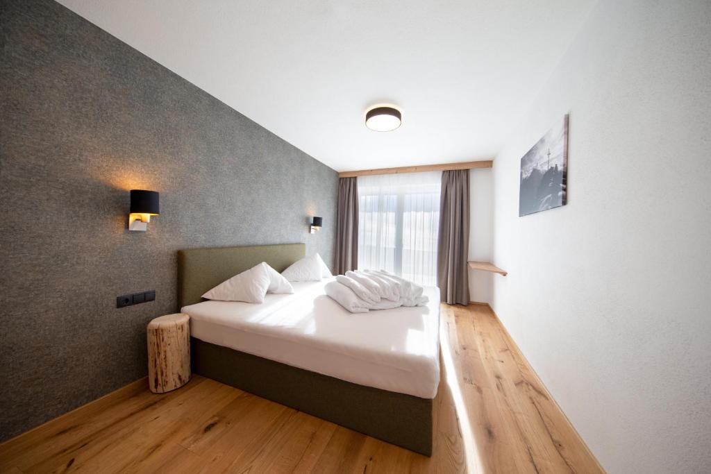 A bed or beds in a room at A CASA Granat