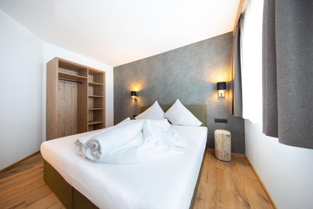 A bed or beds in a room at A CASA Granat