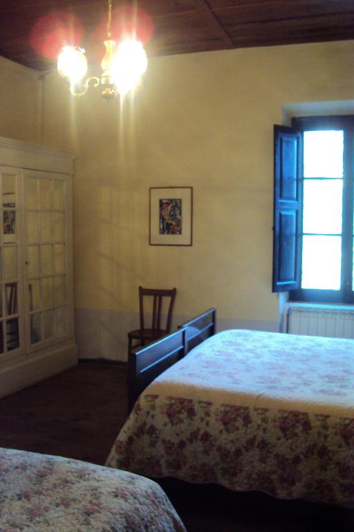 Posteľ alebo postele v izbe v ubytovaní Locanda Dei Baroni - Antica Dimora