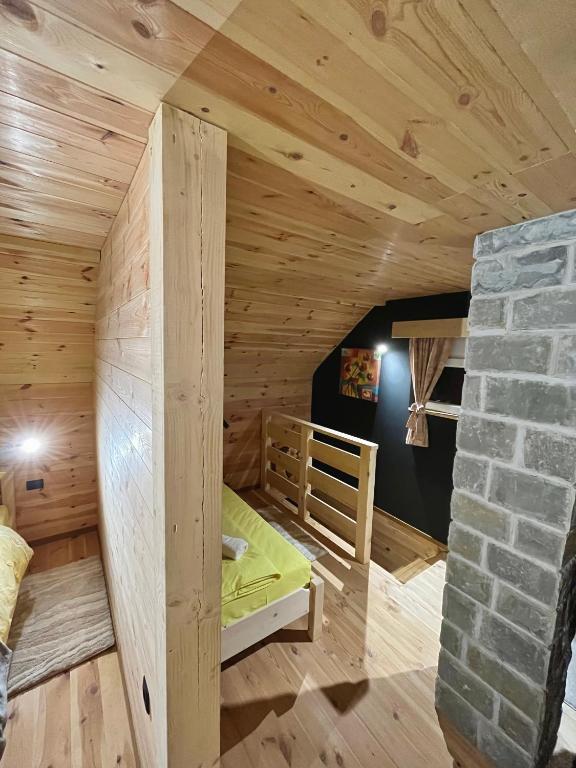 Postel nebo postele na pokoji v ubytování Apartman Kruna