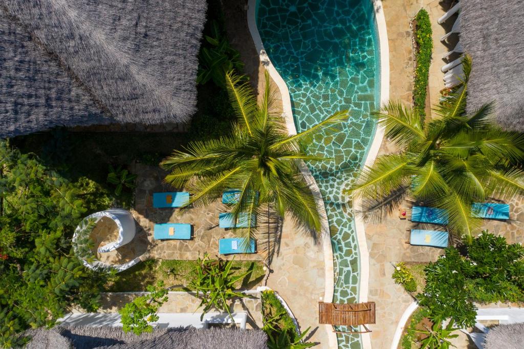 an overhead view of a resort with a swimming pool at Rafiki Village in Watamu