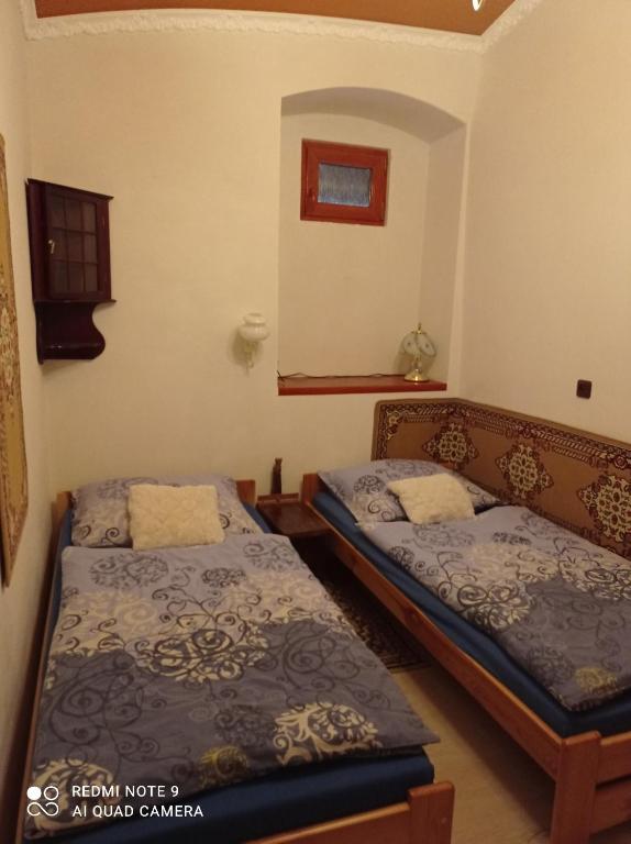 Postel nebo postele na pokoji v ubytování Atlantis Apartmán 1