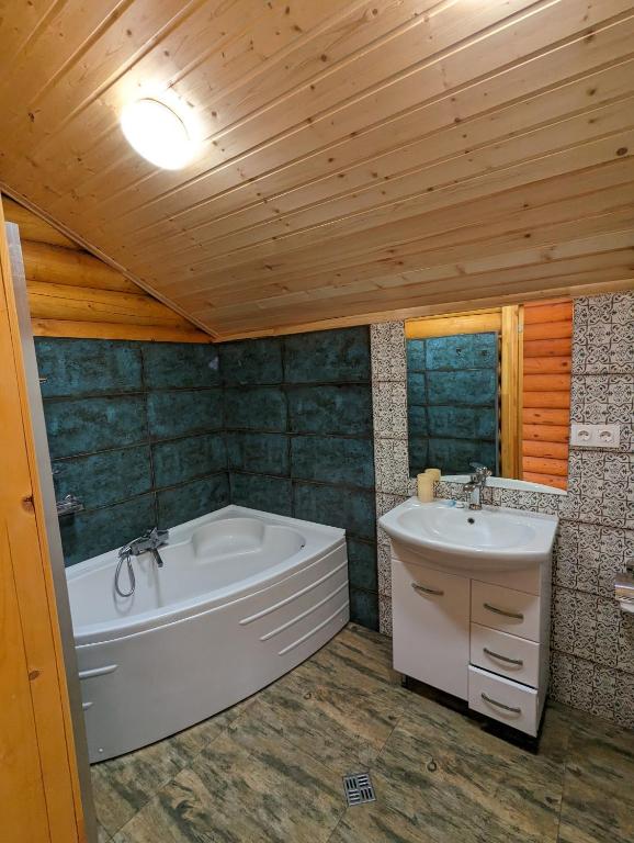 Koupelna v ubytování LOG HOUSE