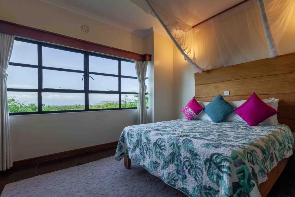 Postel nebo postele na pokoji v ubytování Punda Milias Lodge