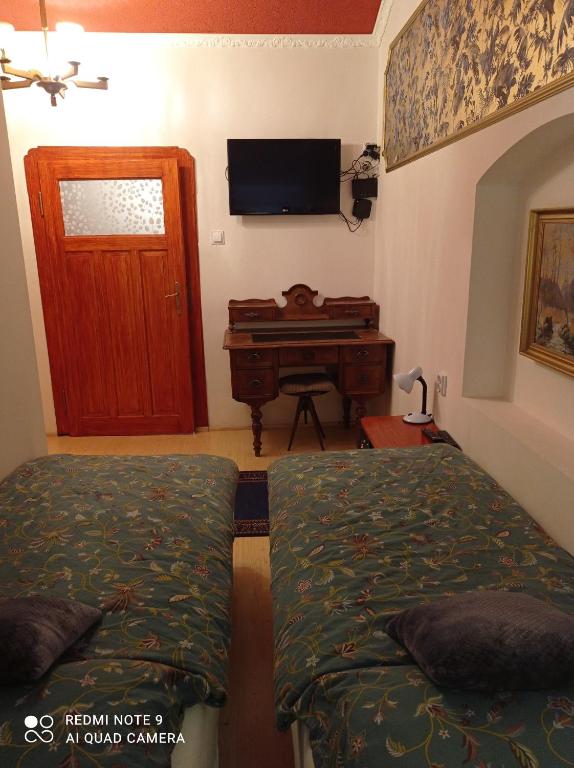 Postel nebo postele na pokoji v ubytování Atlantis Apartmán 2