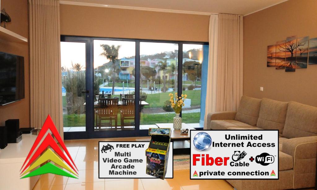 a living room with a table with signs on it at AlgarveFlat in Albufeira