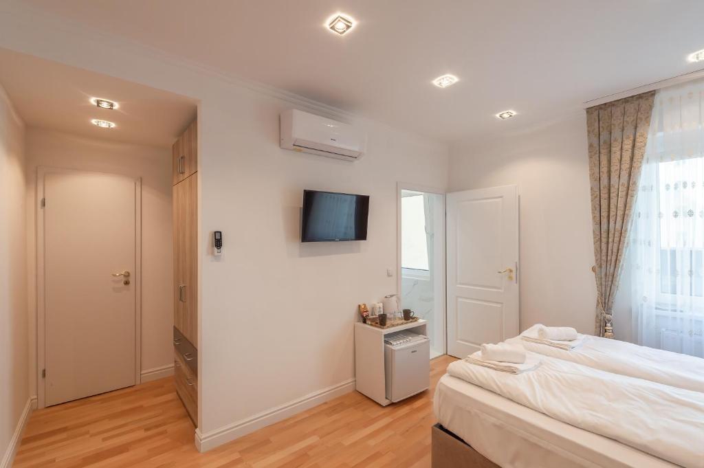 Łóżko lub łóżka w pokoju w obiekcie Cool Boutique Apartments - Leopoldstadt