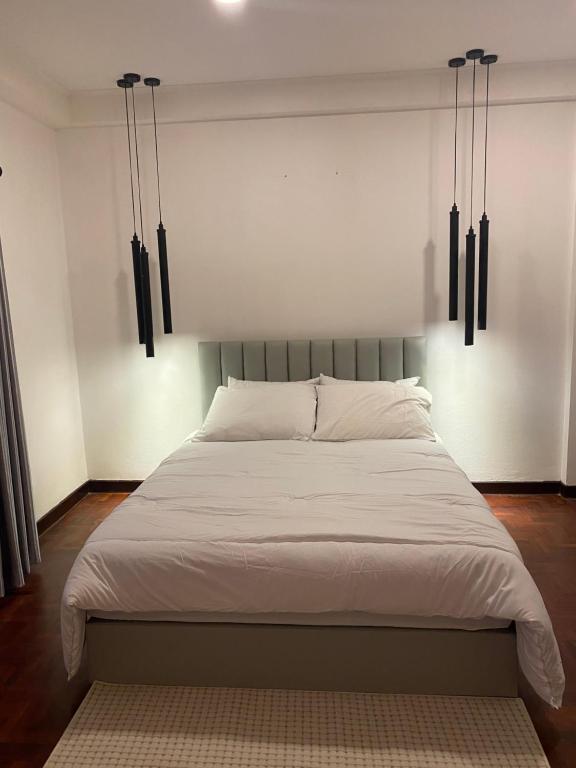 Postel nebo postele na pokoji v ubytování Chocolove hostel @cnx
