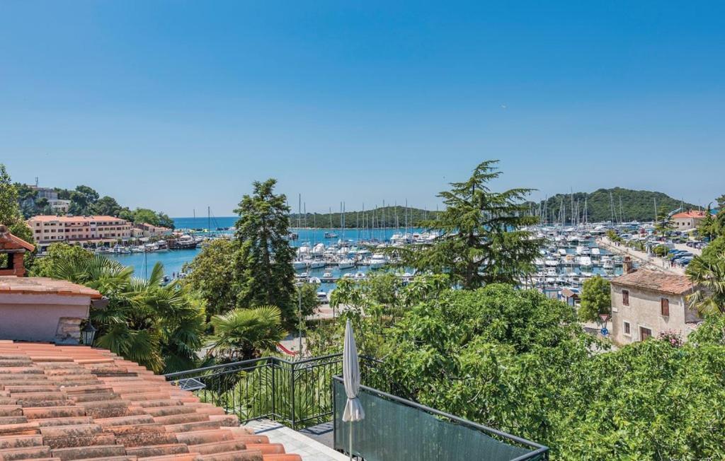 a view of a harbor with boats in the water at Apartman Karo in Vrsar