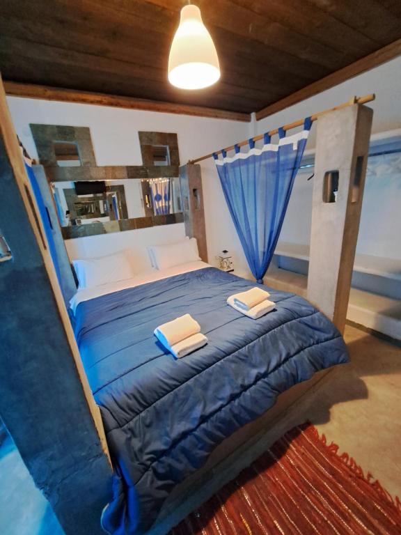 Voodi või voodid majutusasutuse Naval Hotel Aegina toas