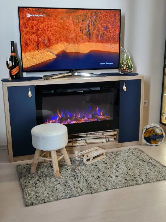 TV a/nebo společenská místnost v ubytování Mountain Peak Apartment