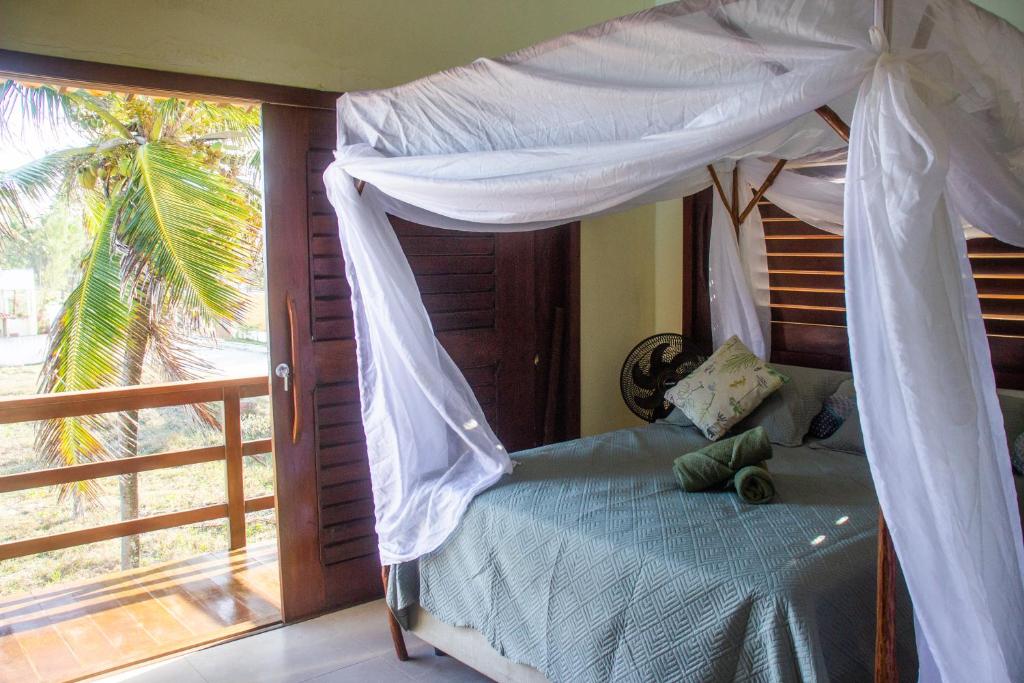 Postel nebo postele na pokoji v ubytování Beach Suites Villa Drisana