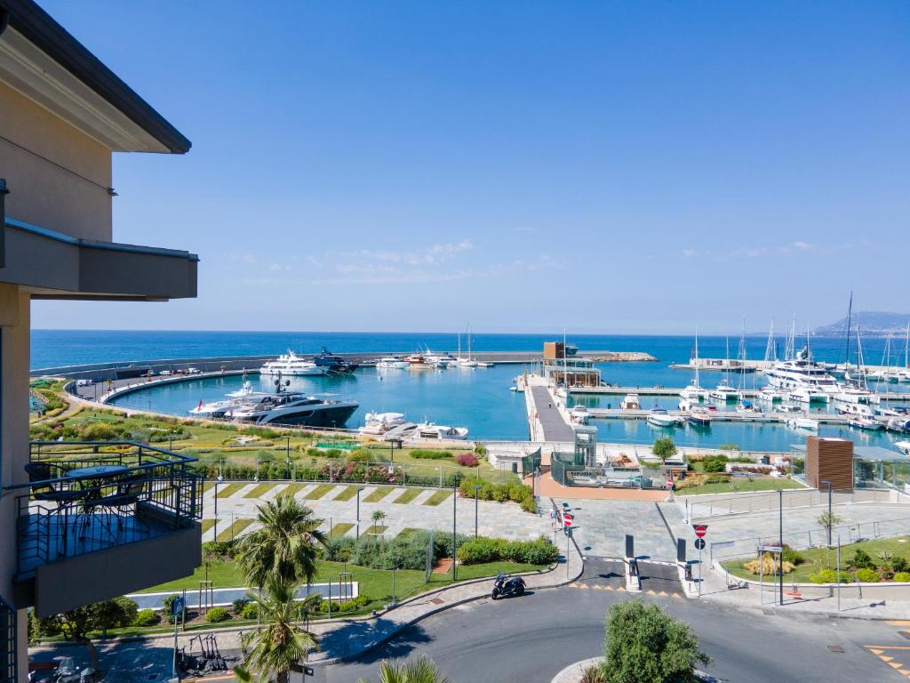a view of a marina with boats in the water at Sole Mare in Ventimiglia