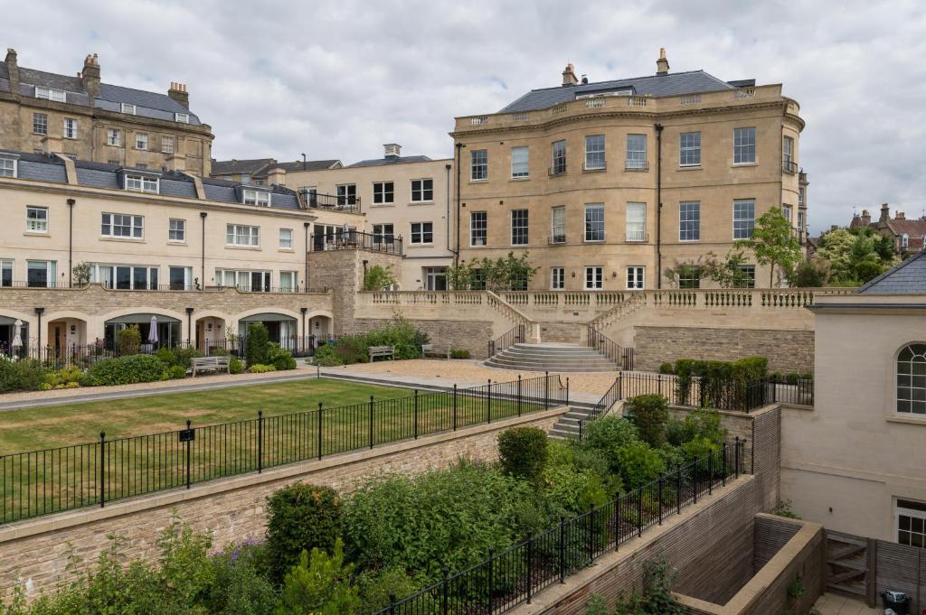 a group of buildings with stairs in front of them at Bath Penthouse with amazing views and lift access in Bath