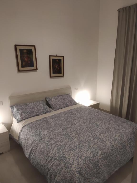 Postel nebo postele na pokoji v ubytování CASA DEGLI ANTO'