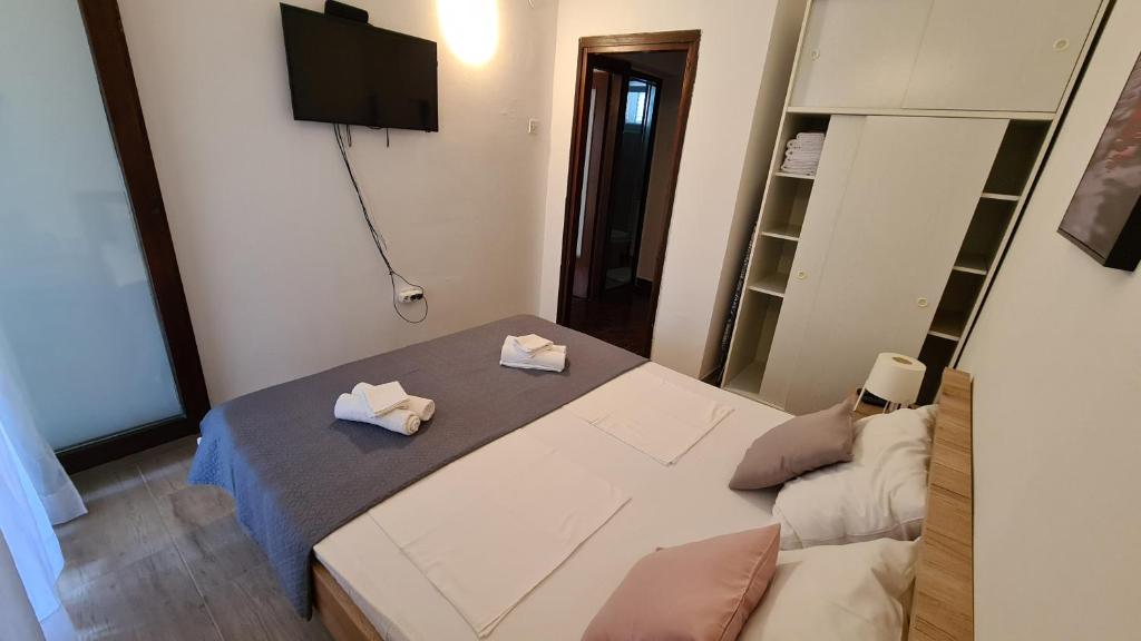 Postel nebo postele na pokoji v ubytování Apartman Hope