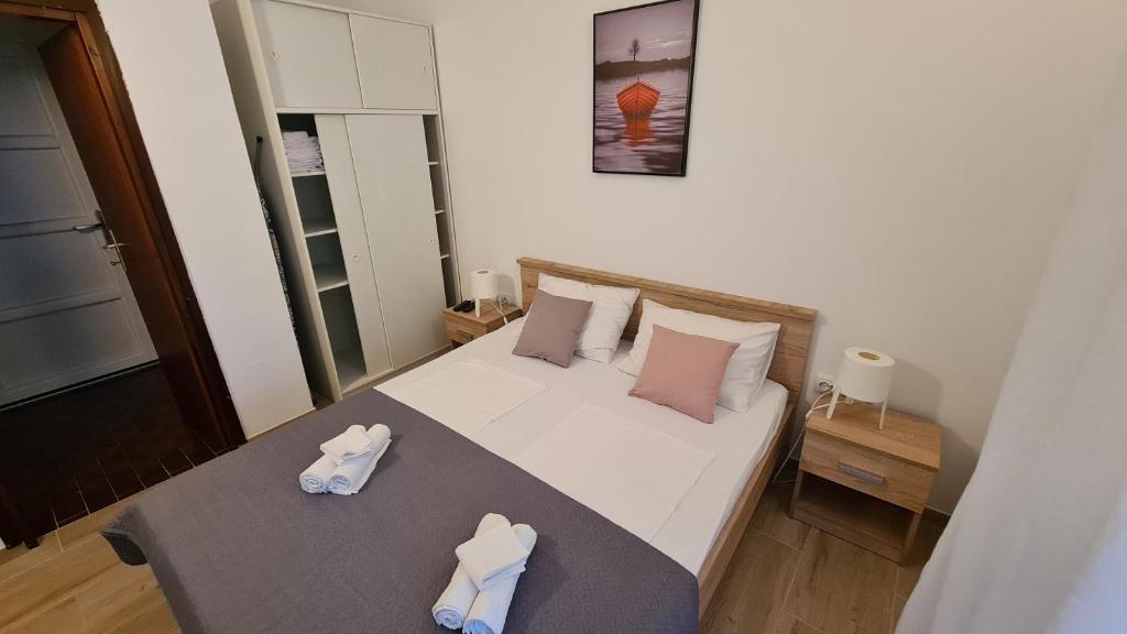 Postel nebo postele na pokoji v ubytování Apartman Hope