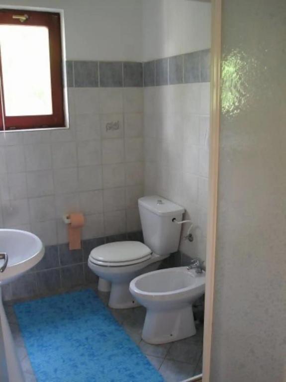 Kúpeľňa v ubytovaní Apartments Davorka Šimuni