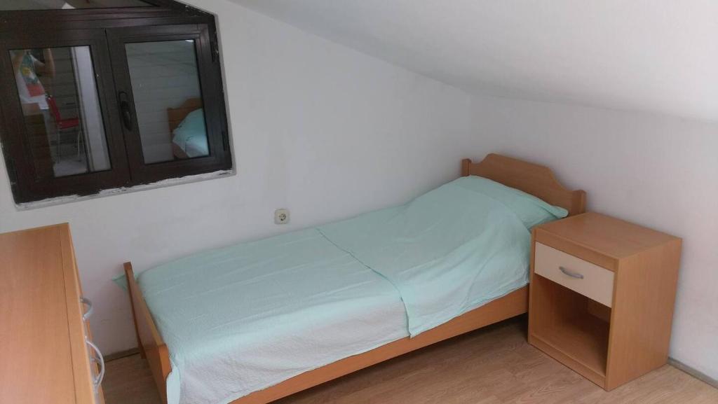 Posteľ alebo postele v izbe v ubytovaní Apartments Davorka Šimuni