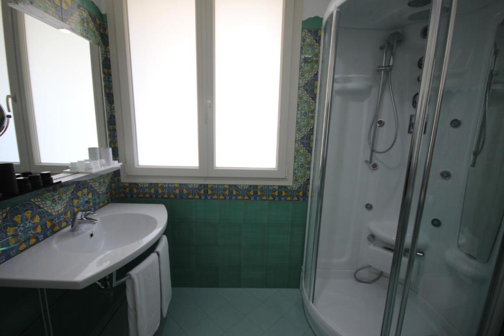 Koupelna v ubytování Boutique Hotel Paradiso Bovelacci