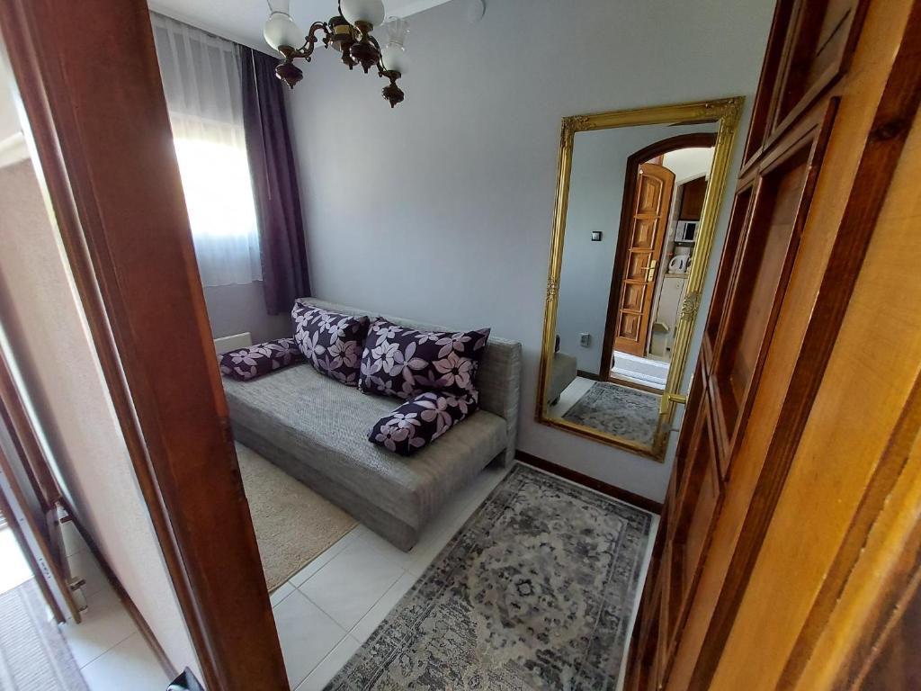 Łóżko lub łóżka w pokoju w obiekcie Titi Boutique Apartmanok