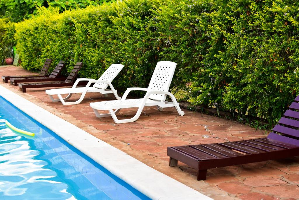Bazén v ubytování Palmas Park Hotel y Restaurant nebo v jeho okolí