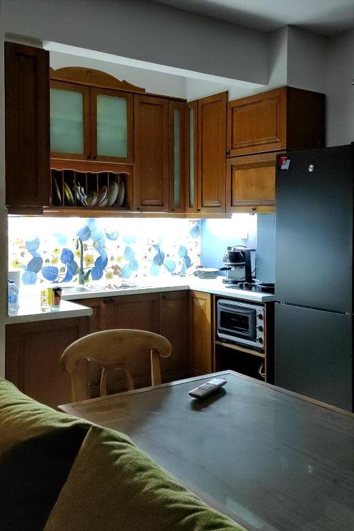 Kuchyň nebo kuchyňský kout v ubytování Kasoni Home , Απόλυτα κεντρικό διαμέρισμα μπροστά στη λίμνη