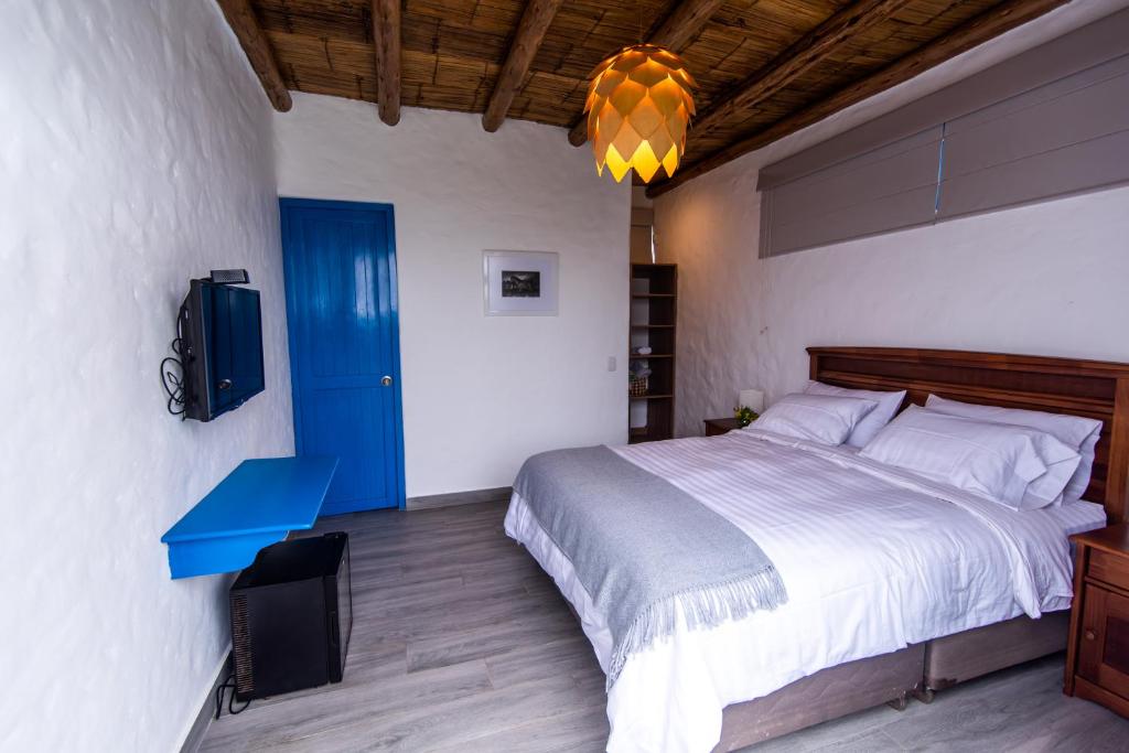 Postel nebo postele na pokoji v ubytování Topara Hotel Boutique