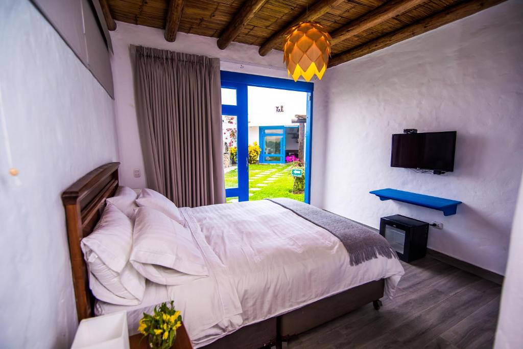 Postel nebo postele na pokoji v ubytování Topara Hotel Boutique