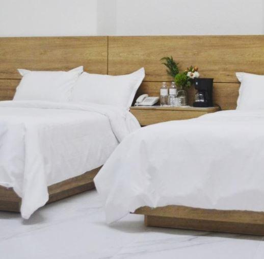 Postel nebo postele na pokoji v ubytování Vía Real Hotel Boutique