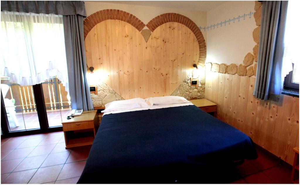 Letto o letti in una camera di Maso La Vecchia Quercia