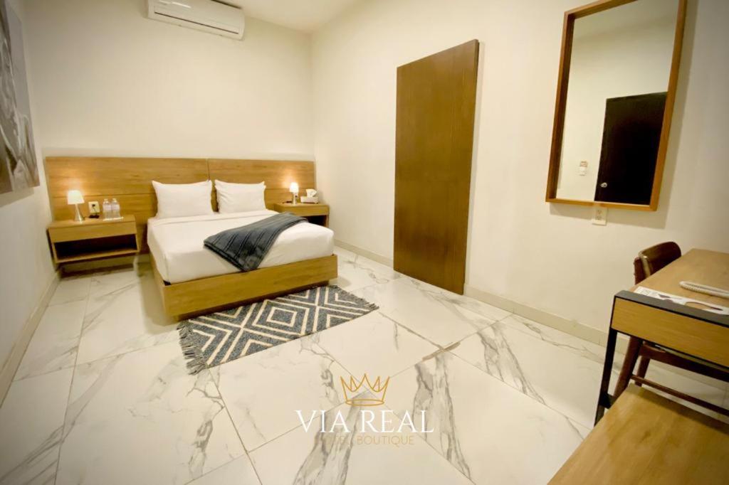 Postel nebo postele na pokoji v ubytování Vía Real Hotel Boutique