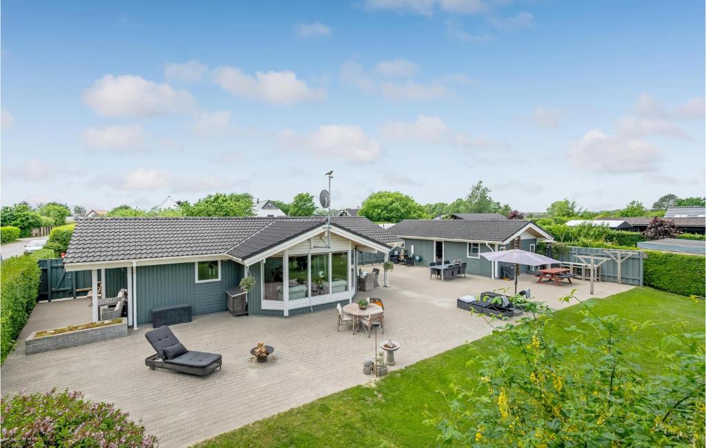 an aerial view of a house with a deck at Cozy Home In Eg With Kitchen in Egå
