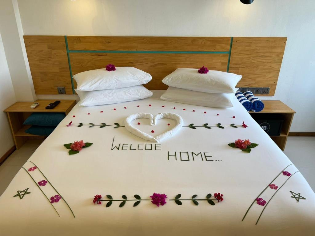 Postel nebo postele na pokoji v ubytování Wish Guesthouse