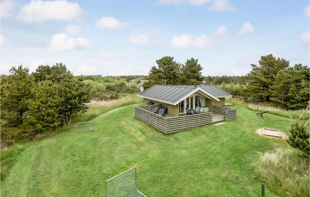 a rendering of a tiny house on a lawn at Holiday Home Ringvejen Rømø I in Bolilmark