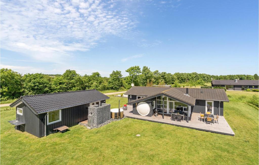 an aerial view of a home with a large yard at Gorgeous Home In Ejstrupholm With Wifi in Krejbjerg