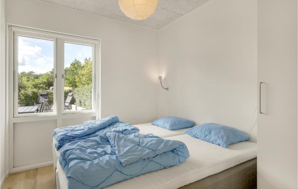 Postel nebo postele na pokoji v ubytování Nice Apartment In Nexø With Wifi