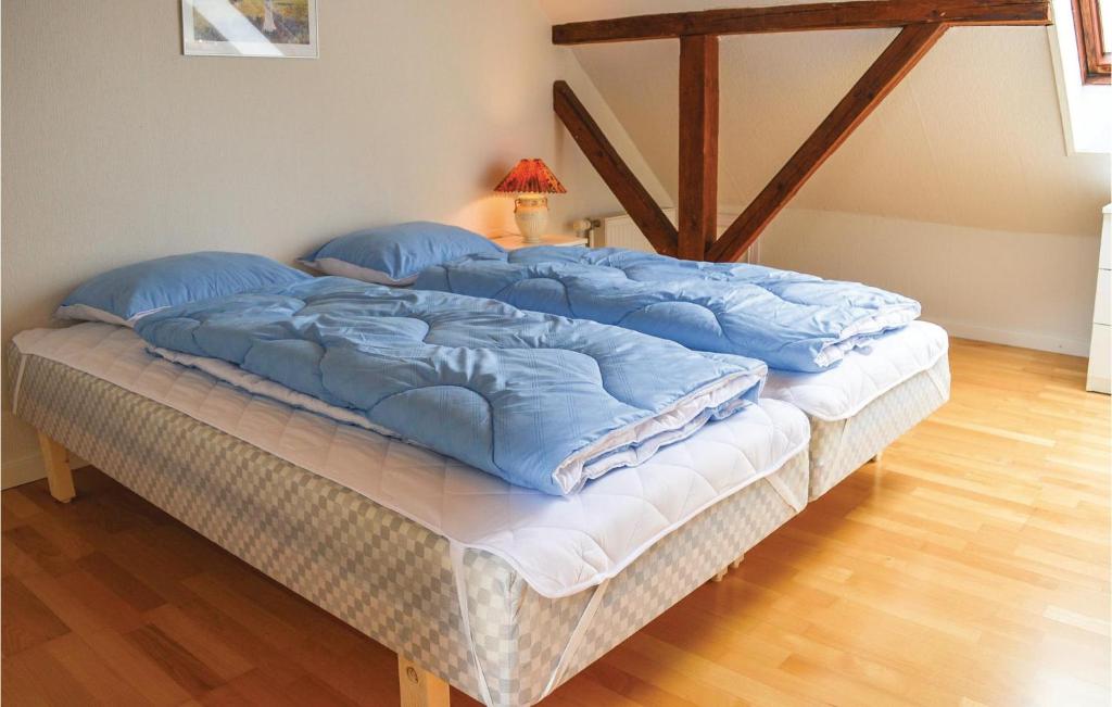 Postel nebo postele na pokoji v ubytování Holiday Home Ringkobing Ii