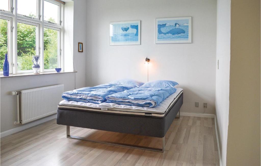Postel nebo postele na pokoji v ubytování Holiday Home Ringkobing Ii