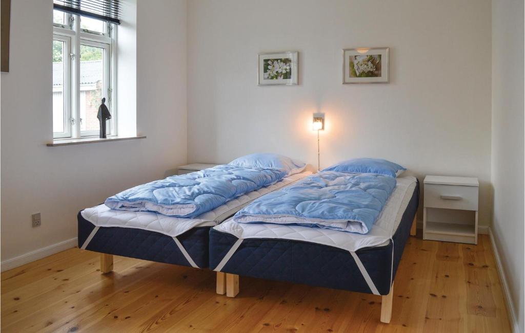 Postel nebo postele na pokoji v ubytování Holiday Home Ringkobing Ii