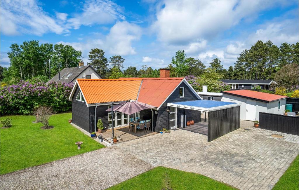 an overhead view of a house with an orange roof at Stunning Home In Sjællands Odde in Yderby