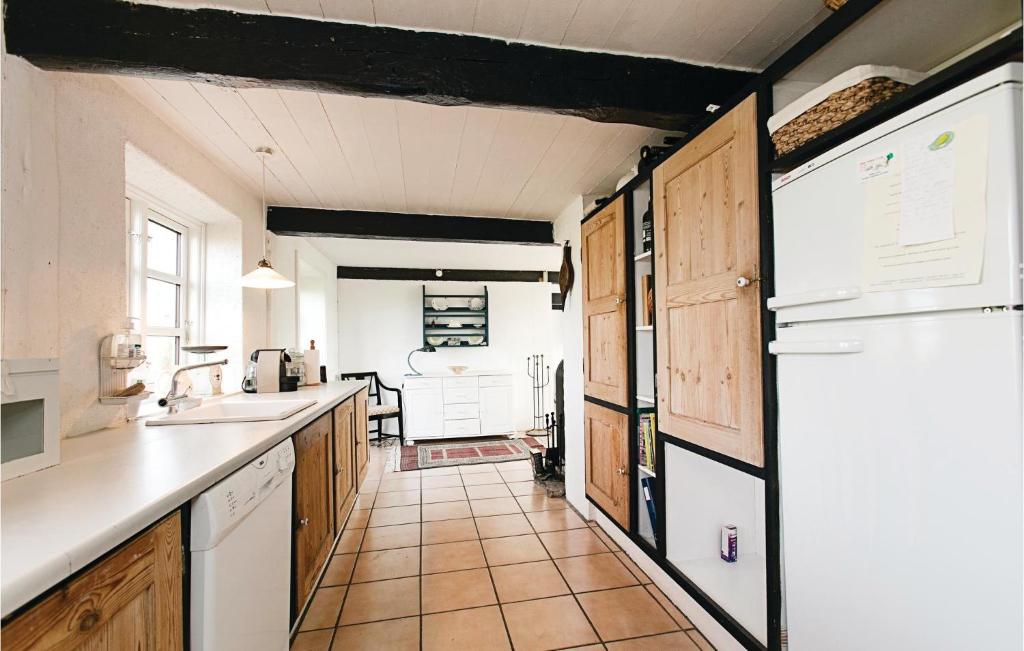 Kuchyň nebo kuchyňský kout v ubytování Holiday Home Skolevejen